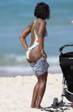 KELLY ROWLAND in Swimsuit on the Beach in Sydney 03/27/2017