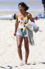 KELLY ROWLAND in Swimsuit on the Beach in Sydney 03/27/2017