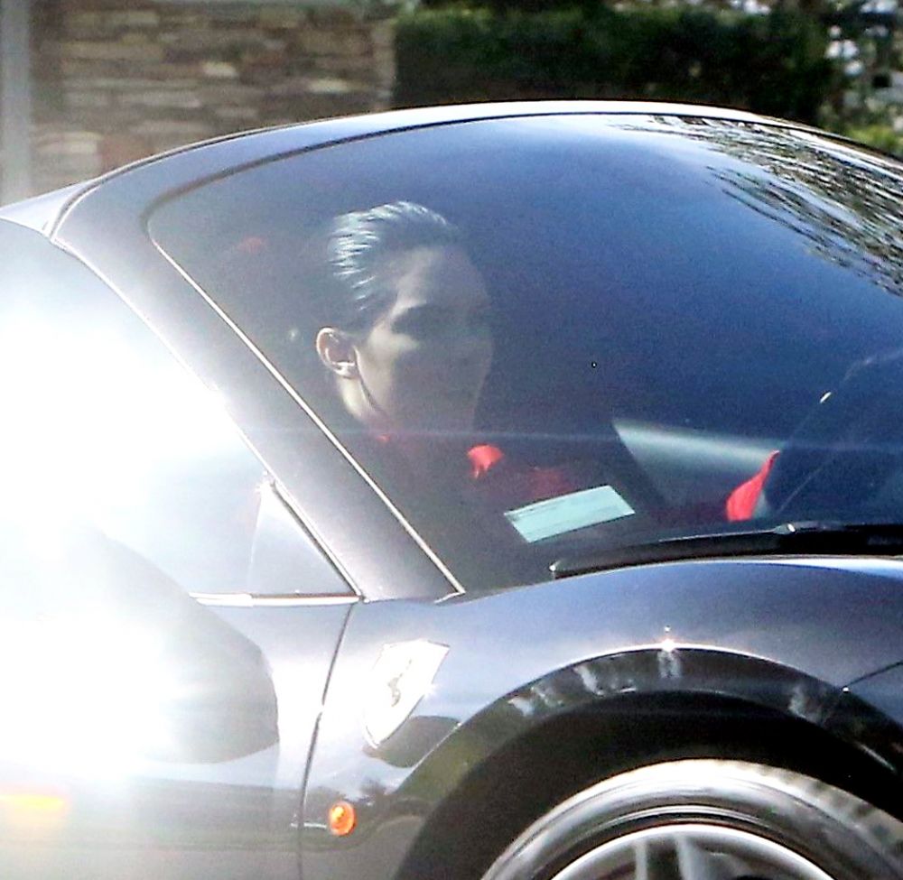 KENDALL JENNER Drives Her Ferrari Out in West Hollywood 03/19/2017 KENDALL JENNER Drives Her Ferrari Out in West Hollywood 03/19/2017