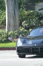 KENDALL JENNER Drives Her Ferrari Out in West Hollywood 03/19/2017