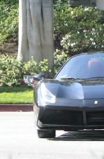 KENDALL JENNER Drives Her Ferrari Out in West Hollywood 03/19/2017