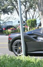 KENDALL JENNER Drives Her Ferrari Out in West Hollywood 03/19/2017