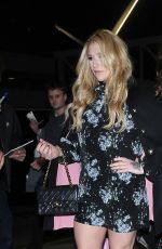 KESHA SEBERT with Her Boyfriend Brad Ashenfelter at LAX in Los Angeles 03/22/2017