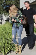 KHLOE KARDASHIAN in Ripped Jeans Leaves a Studio in West Lake 03/28/2017