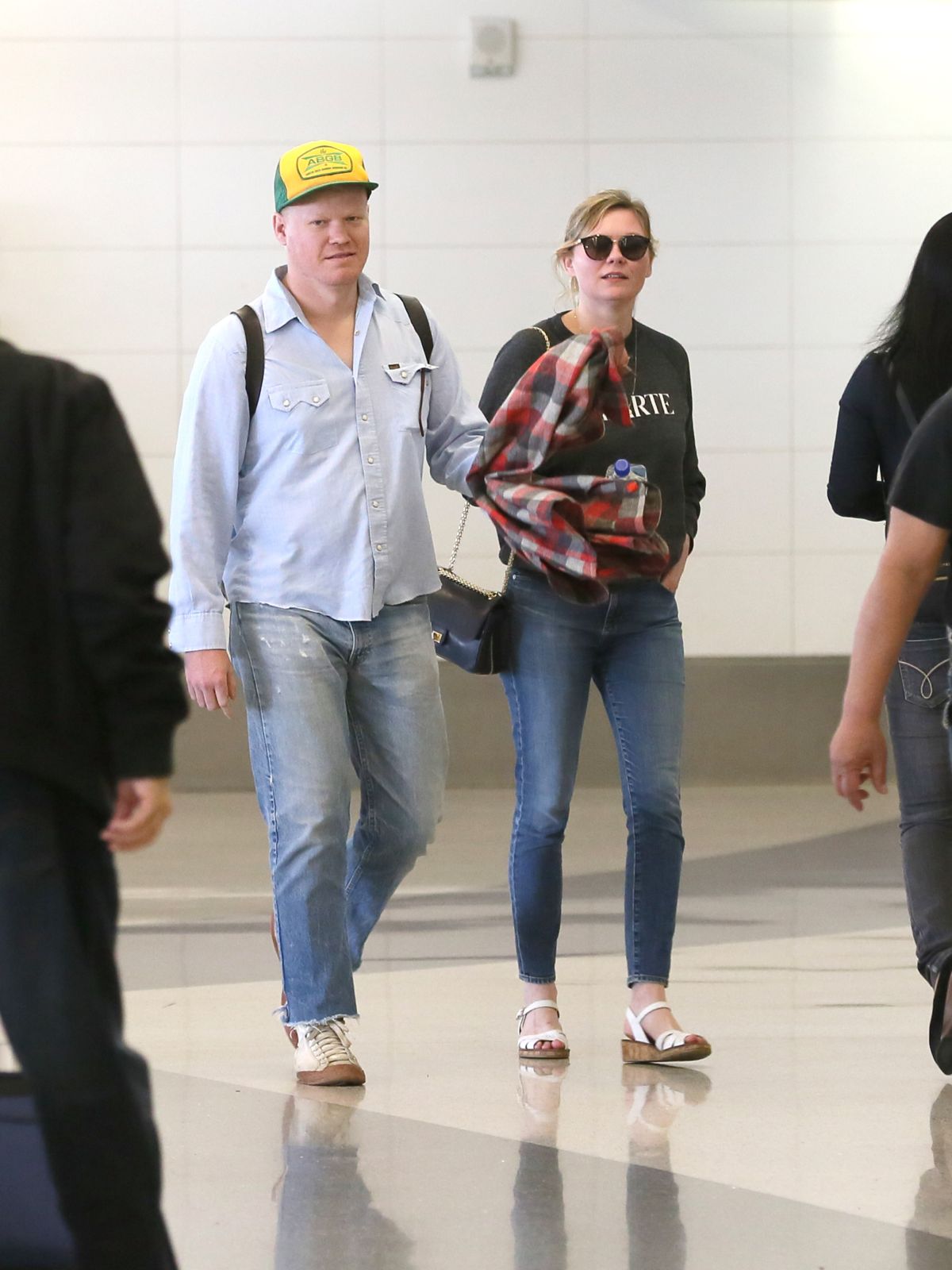 KIRSTEN DUNST and Jesse Plemons at LAX Airport in Los Angeles 03/24/2017 KIRSTEN DUNST and Jesse Plemons at LAX Airport in Los Angeles 03/24/2017