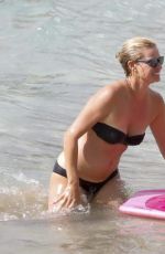 KRISTY HINZE in Bikini at a Beach in St Barts 03/23/2017
