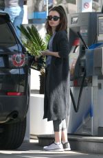 LILY COLLINS at a Gas Station in Beverly Hills 03/29/2017