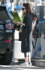 LILY COLLINS at a Gas Station in Beverly Hills 03/29/2017