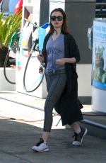LILY COLLINS at a Gas Station in Beverly Hills 03/29/2017