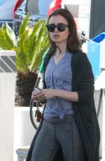 LILY COLLINS at a Gas Station in Beverly Hills 03/29/2017