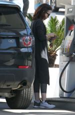 LILY COLLINS at a Gas Station in Beverly Hills 03/29/2017