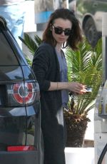 LILY COLLINS at a Gas Station in Beverly Hills 03/29/2017