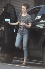 LILY COLLINS Out for Coffee from Coffee Bean in West Hollywood 03/14/2017