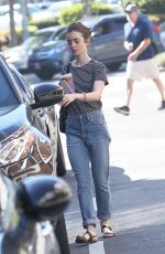 LILY COLLINS Out for Coffee from Coffee Bean in West Hollywood 03/14/2017