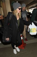 MARGOT ROBBIE at Los Angeles International Airport 03/02/2017