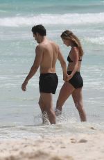 MELISSA BENOIST and Chris Wood at a Beach in Cancun 03/29/2017