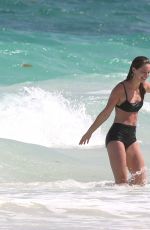 MELISSA BENOIST and Chris Wood at a Beach in Cancun 03/29/2017