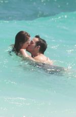 MELISSA BENOIST and Chris Wood at a Beach in Cancun 03/29/2017