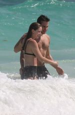 MELISSA BENOIST and Chris Wood at a Beach in Cancun 03/29/2017