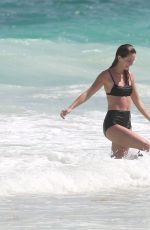 MELISSA BENOIST and Chris Wood at a Beach in Cancun 03/29/2017