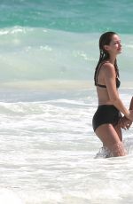 MELISSA BENOIST and Chris Wood at a Beach in Cancun 03/29/2017