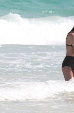 MELISSA BENOIST and Chris Wood at a Beach in Cancun 03/29/2017