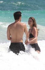 MELISSA BENOIST and Chris Wood at a Beach in Cancun 03/29/2017