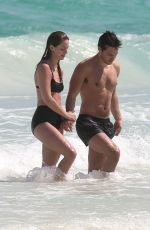 MELISSA BENOIST and Chris Wood at a Beach in Cancun 03/29/2017