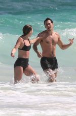 MELISSA BENOIST and Chris Wood at a Beach in Cancun 03/29/2017