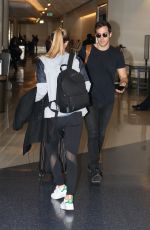 MELISSA BENOIST at LAX Airport in Los Angeles 03/19/2017