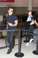 MELISSA BENOIST at LAX Airport in Los Angeles 03/19/2017