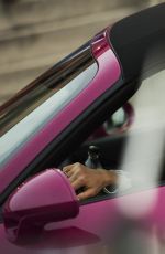 MICHELLE HUNZIKER Driving Her New Porsche Out in Milan 03/24/2017