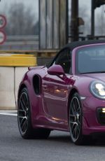 MICHELLE HUNZIKER Driving Her New Porsche Out in Milan 03/24/2017