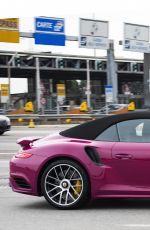MICHELLE HUNZIKER Driving Her New Porsche Out in Milan 03/24/2017