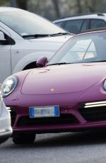 MICHELLE HUNZIKER Driving Her New Porsche Out in Milan 03/24/2017
