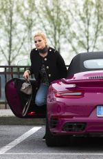 MICHELLE HUNZIKER Driving Her New Porsche Out in Milan 03/24/2017