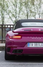 MICHELLE HUNZIKER Driving Her New Porsche Out in Milan 03/24/2017