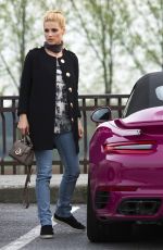MICHELLE HUNZIKER Driving Her New Porsche Out in Milan 03/24/2017