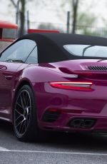 MICHELLE HUNZIKER Driving Her New Porsche Out in Milan 03/24/2017