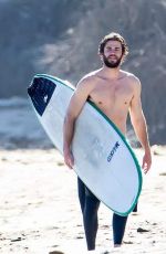 MILEY CYRUS and Liam Hemsworth at a Beach in Malibu 03/01/2017