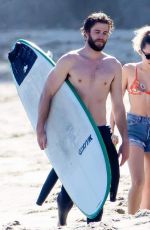 MILEY CYRUS and Liam Hemsworth at a Beach in Malibu 03/01/2017
