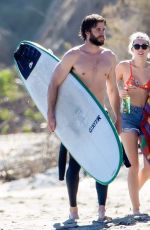 MILEY CYRUS and Liam Hemsworth at a Beach in Malibu 03/01/2017
