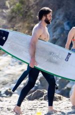 MILEY CYRUS and Liam Hemsworth at a Beach in Malibu 03/01/2017