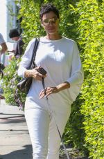 NICOLE MURPHY Walks Her Dog Out in West Hollywood 03/01/2017