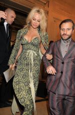 PAMELA ANDERSON Leaves Hotel Costes Restaurant in Paris 03/04/2017