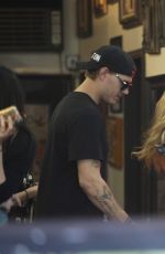 PARIS HILTON and Chris Zylka at a Tattoo Parlor in Los Angeles 03/29/2017