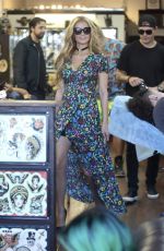 PARIS HILTON and Chris Zylka at a Tattoo Parlor in Los Angeles 03/29/2017