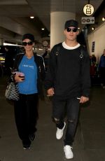 PARIS HILTON and Chris Zylka at LAX Airport in Los Angeles 03/28/2017