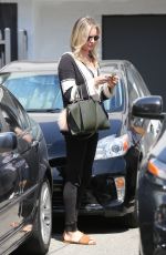 REBECCA ROMIJN Leaves a Hair Salon in Los Angeles 03/30/2017