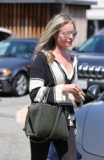 REBECCA ROMIJN Leaves a Hair Salon in Los Angeles 03/30/2017